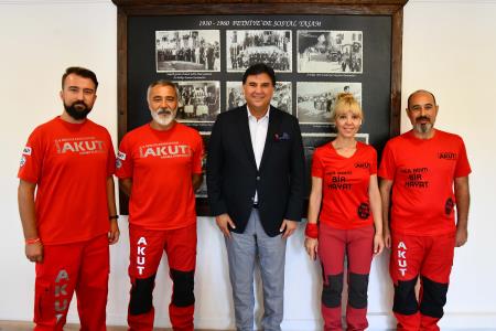 Karaca, AKUT ile görüştü